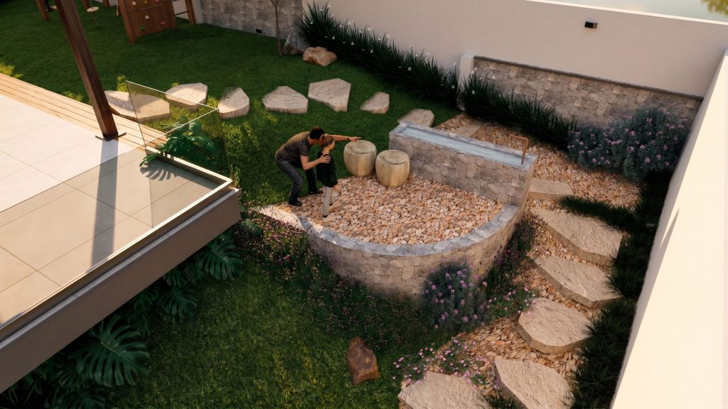Jardim com pedriscos, pedras e pequena fonte na Casa KJ