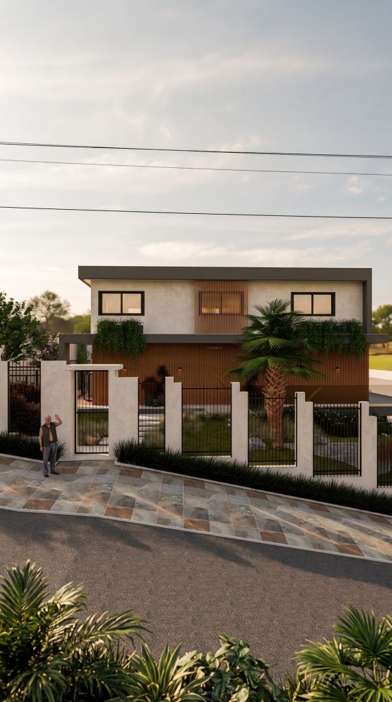 Fachada da Casa KJ com muro e jardim frontal em Caxias do Sul