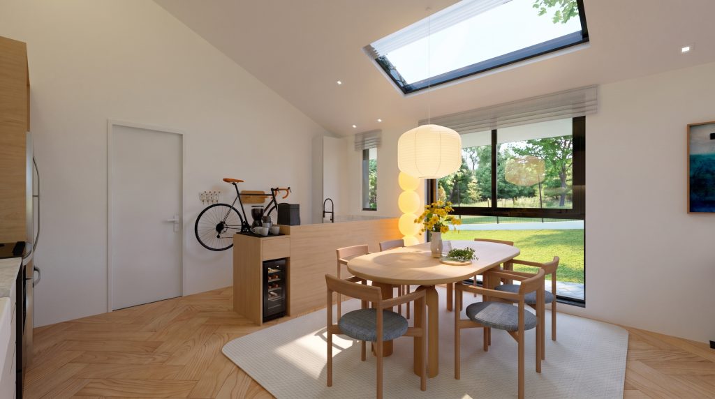 Mesa de jantar junto à janela com vista para o jardim na Casa EV